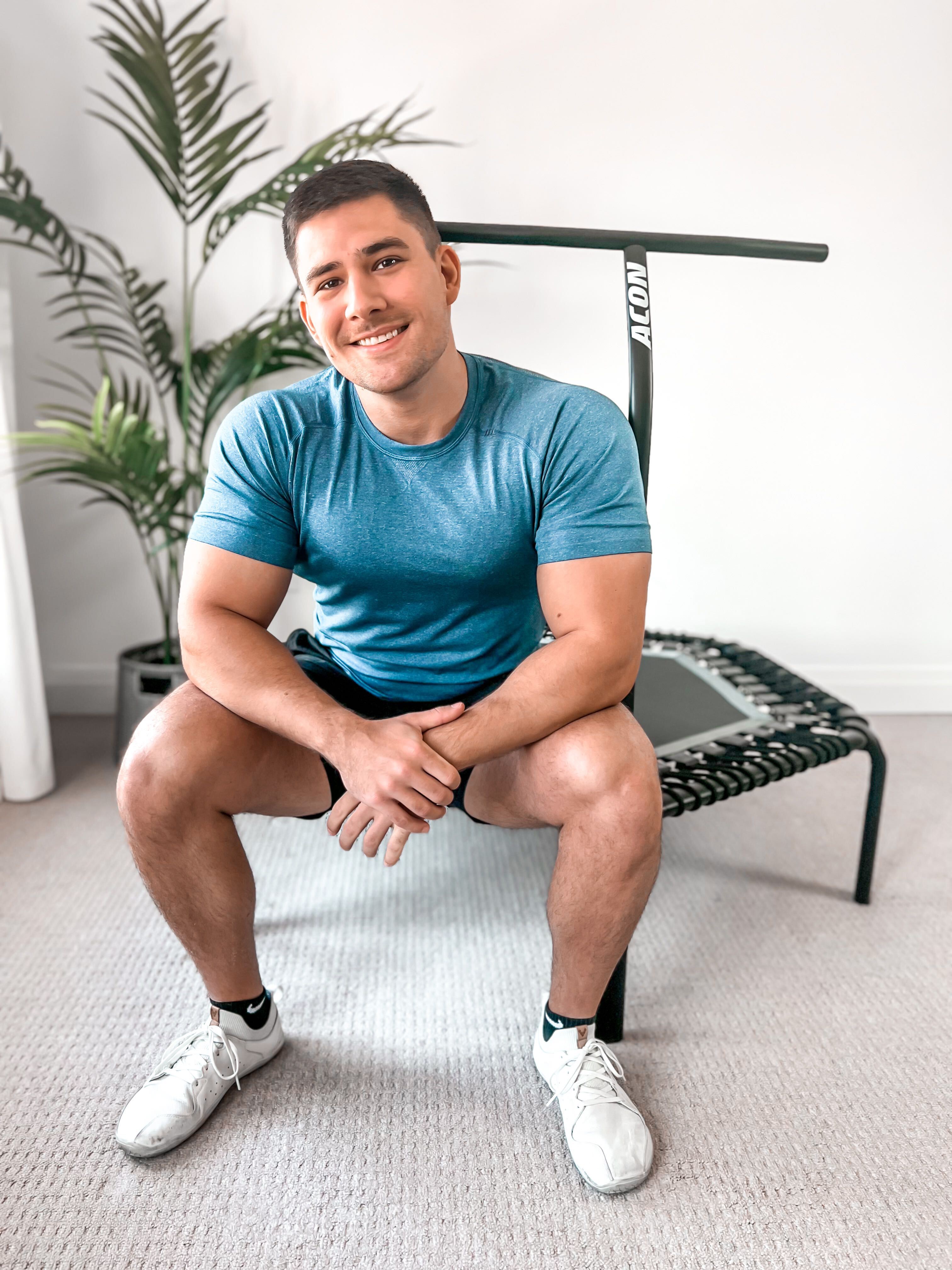 Man sitting on an Acon Rebounder.