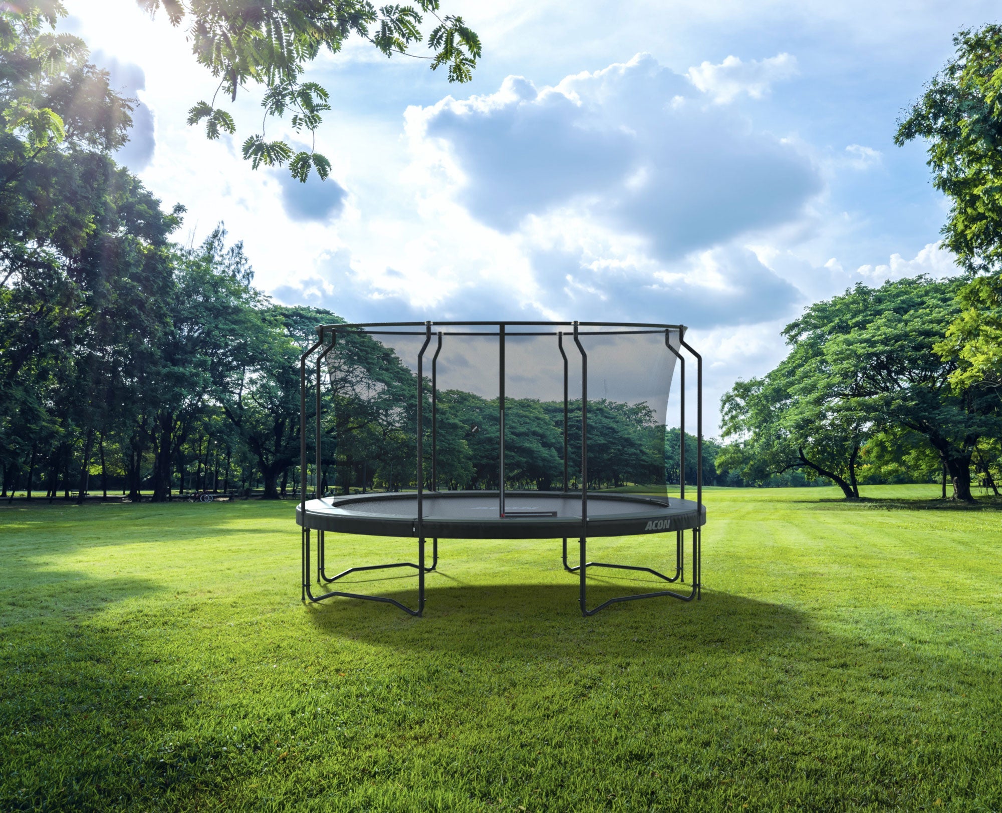Acon round trampoline with premium safety net in a yard.