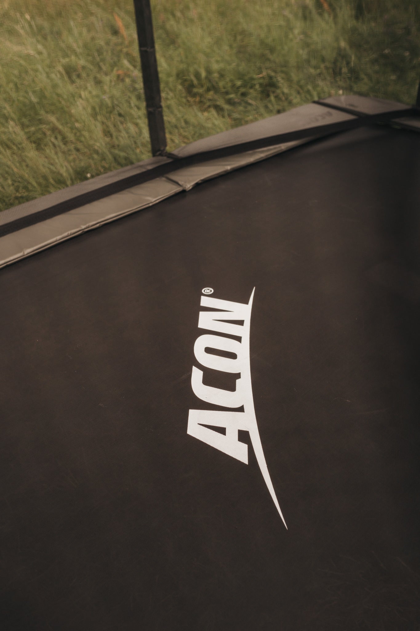 Closeup of ACON trampoline and its black mat
