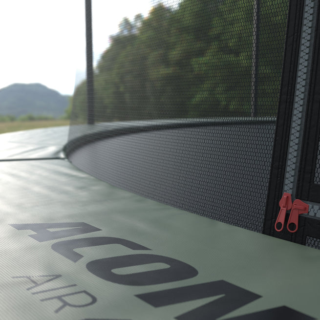 Detail of the round Acon trampoline safety padding and Premium Enclosure’s doorway