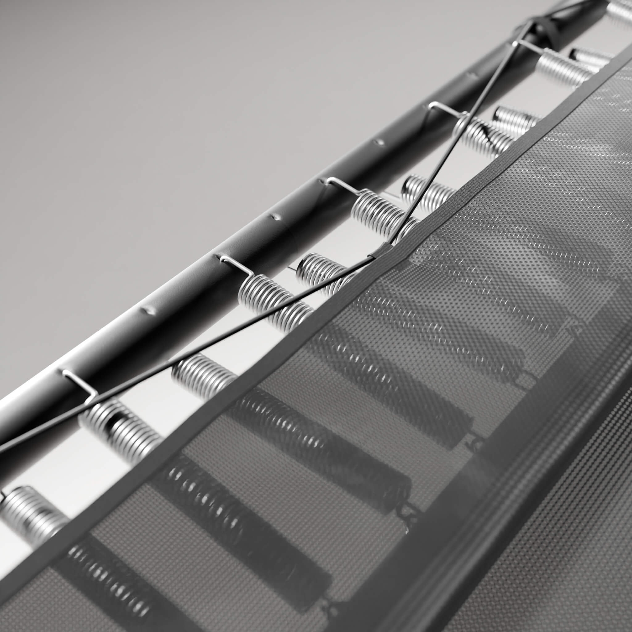 Detail of the skirt covering the springs of the Acon 13 HD trampoline and the dual-level spring adjustment.