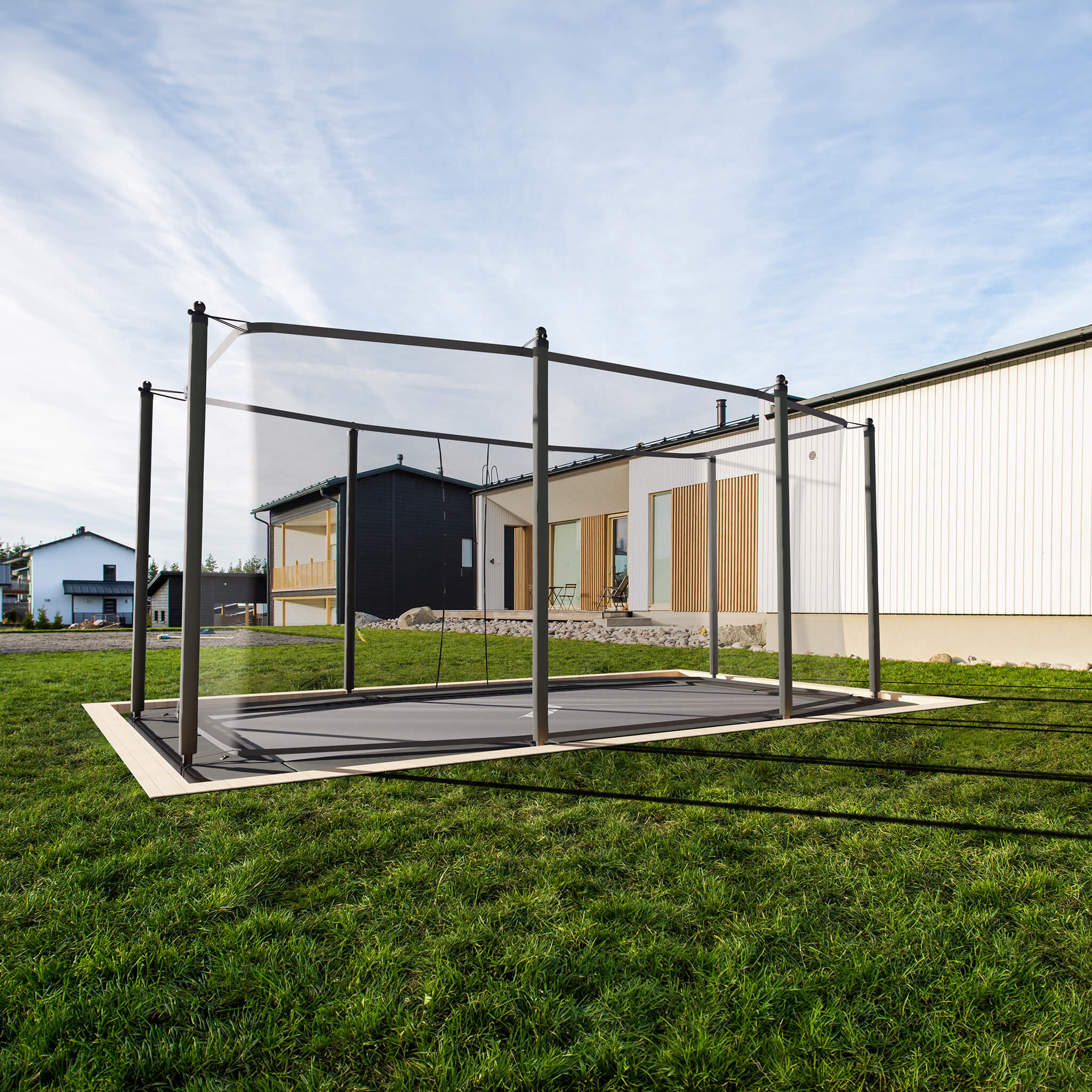 Acon HD Trampoline installed in the ground in the backyard.