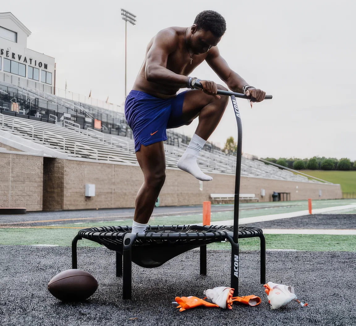 Video thumbnail showing an athlete training on an Acon FIT trampoline at a sports stadium.