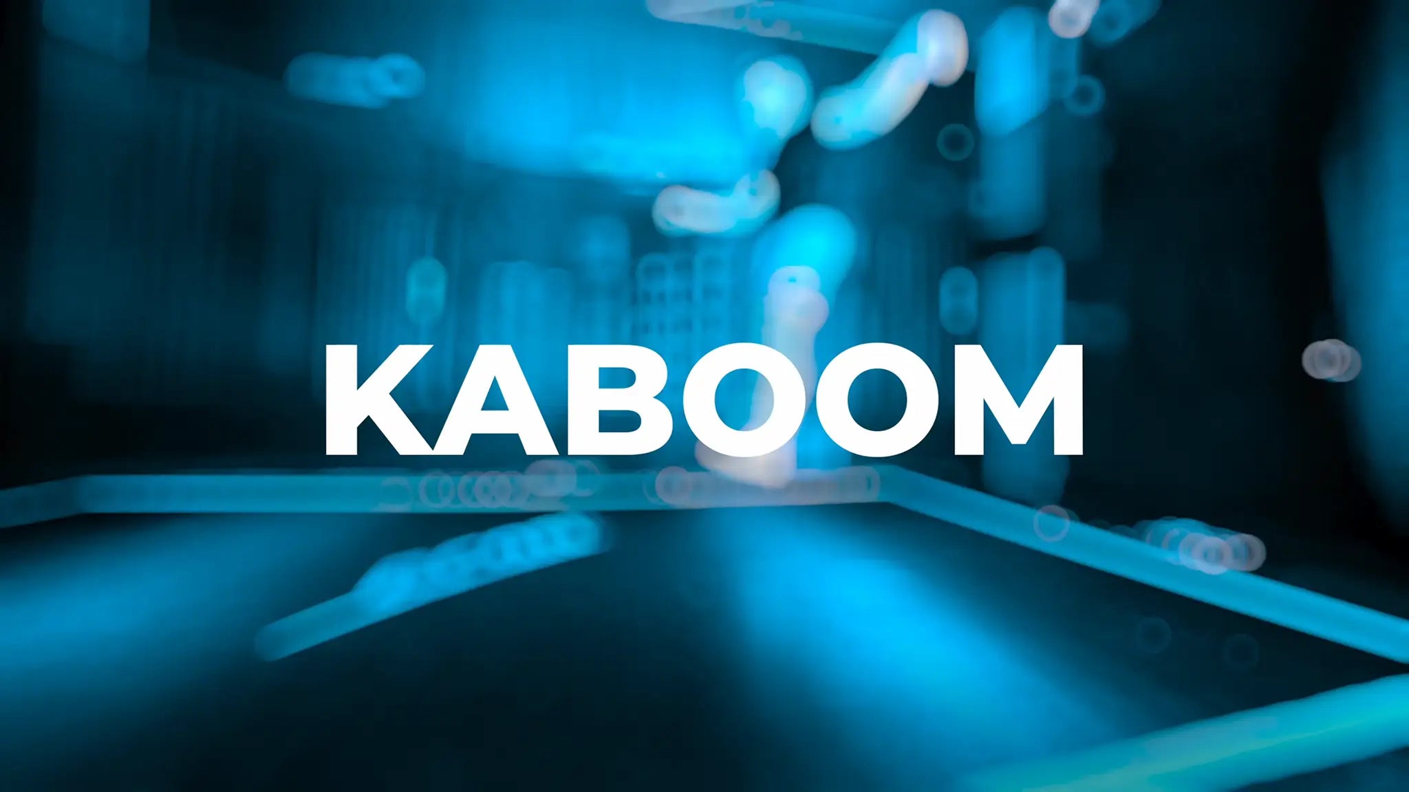 The word "KABOOM" in bold white text on a dark blue background.
