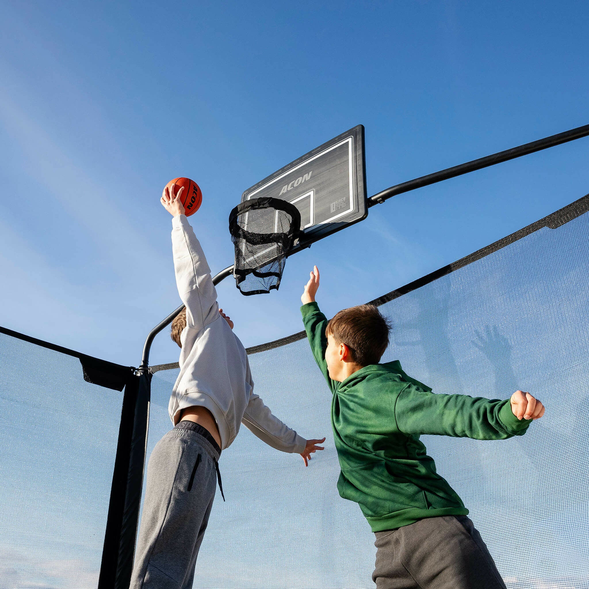 Trampoline with shop a basketball hoop